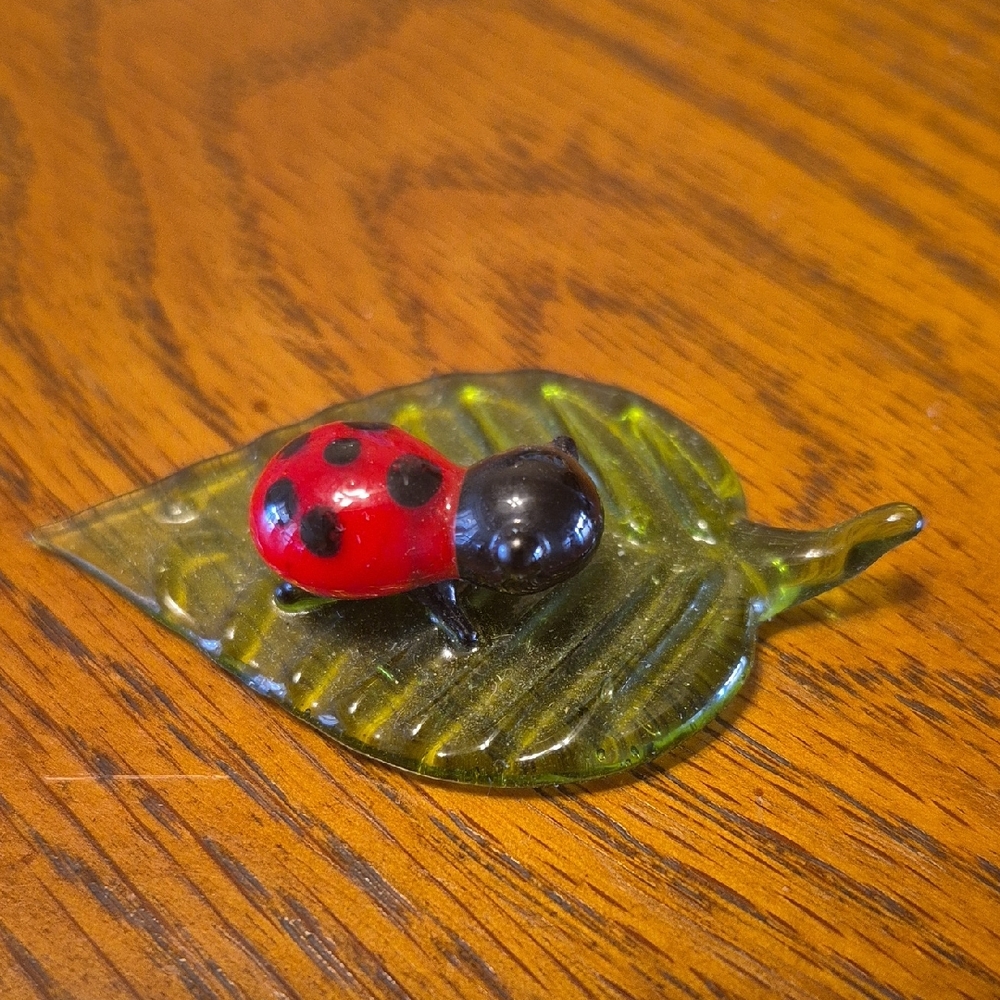 Source Unknown Red and Black Ladybug Glass Art on Green Leaf